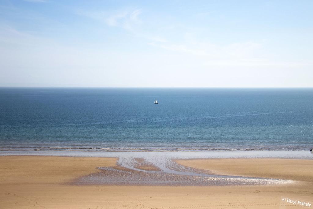 A Boat At Three Cliffs Bay